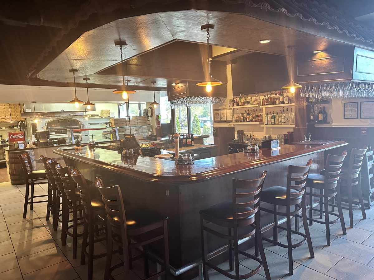 Capriccio Italian restaurant bar area in Myrtle Beach with pendant lights